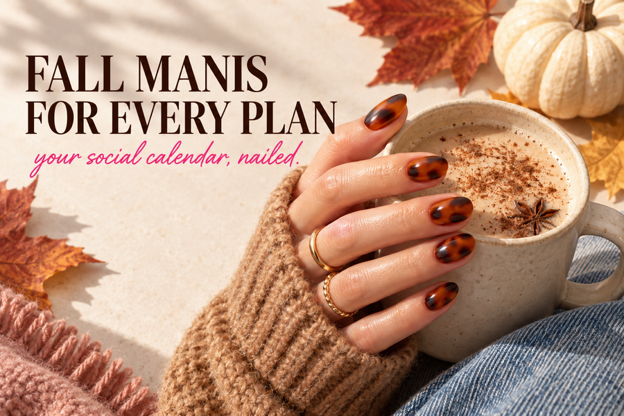 Hand with tortoiseshell press-on nails holding a spiced latte, styled with pumpkins and fall leaves