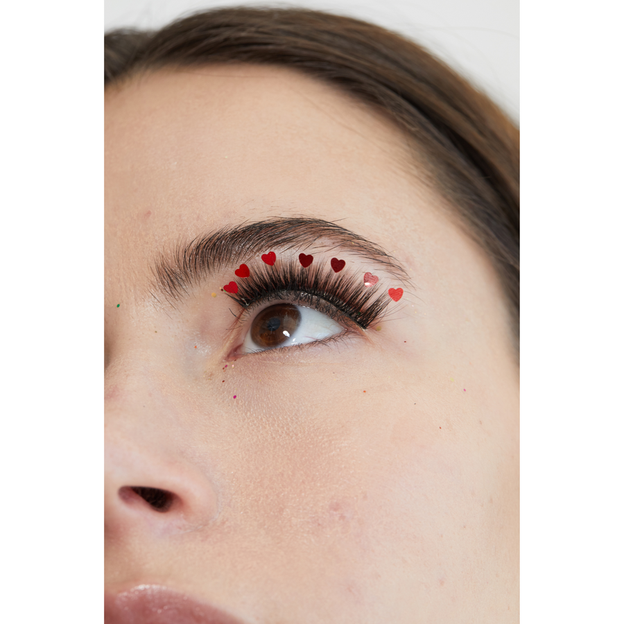 Girl using Red Hearts Lashes