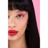 Girl using Pink Love Lashes