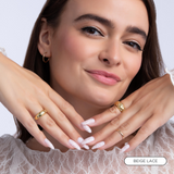 Girl using Beige Lace Almond Press On Nails