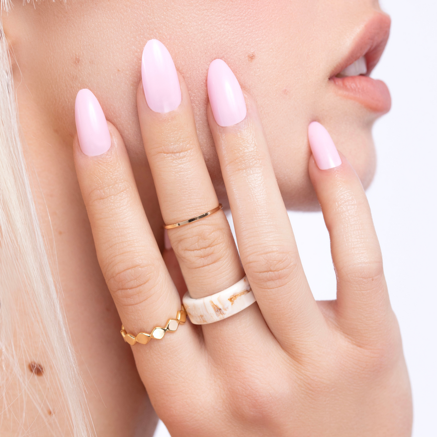 Girl using Millennial Pink Press-on Nails